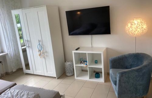 Holte-Spangen Apartamento | CUXTräumer - Stilvolle Ferienwohnung für Paare - WLAN, privater Parkplatz und Grill - Ruhige Lage mit Gartenblick, Nordseestrand und Wernerwald fußläufig, Cuxhaven- Sahlenburg