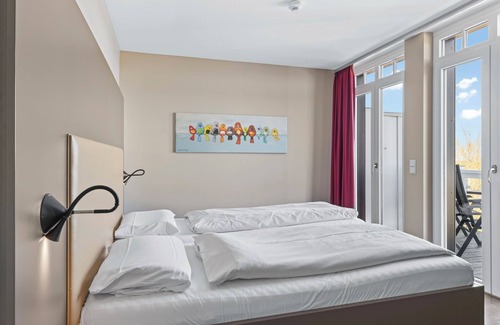 Wremen Apartamento | Dachgeschosswohnung in Strandnähe mit Sauna, Zwei Balkonen und Tollem Ausblick