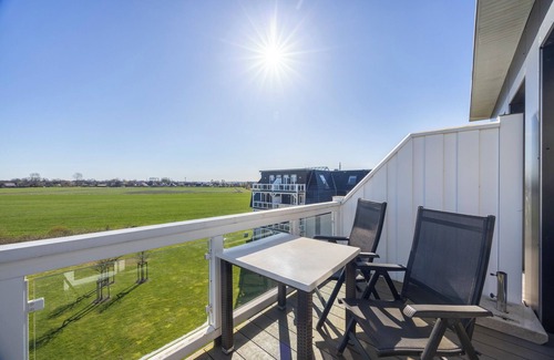 Wremen Apartamento | Dachgeschosswohnung in Strandnähe mit Sauna, Zwei Balkonen und Tollem Ausblick