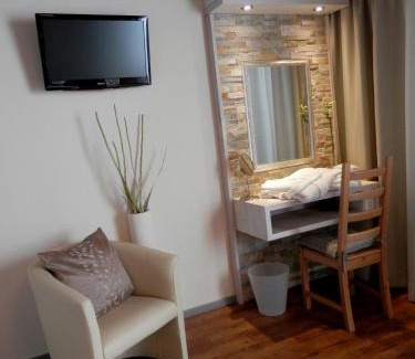 Schuttdorf Hotel | Dahoam by Sarina - Rooms & Suites