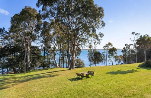Corlette Casa | Danalene, 44a Danalene Pde - stunning waterfront property with Air Con, WI-FI, Double Lock Up Garage & Boat Parking