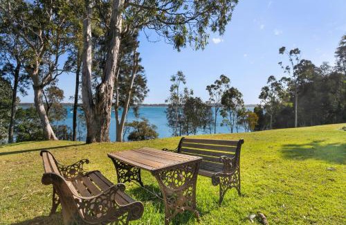 Corlette Casa | Danalene, 44a Danalene Pde - stunning waterfront property with Air Con, WI-FI, Double Lock Up Garage & Boat Parking
