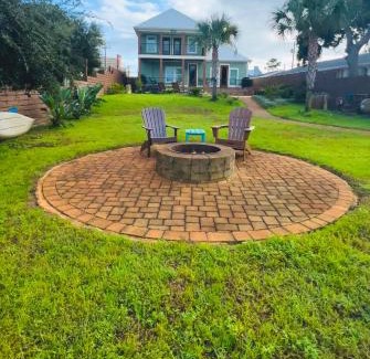 Holiday Beach Casa | Dancin on the Waves On Lagoon Boat dock, Pool, Firepit