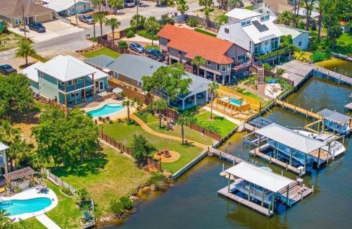 Holiday Beach Casa | Dancin on the Waves On Lagoon Boat dock, Pool, Firepit