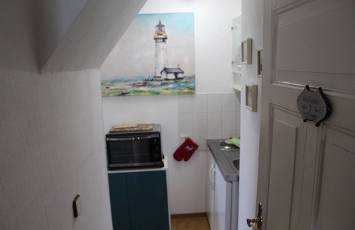 Norderhafen Apartamento | Dat Kapitänshus - Fewo Westwind - Holiday apartment Westwind