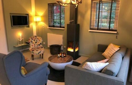 Lievelde Casa | De Brittenburg 4-persoons, finse sauna, hottub, sunshower, grote zonnige omheinde tuin, wifi en huisdier vriendelijk