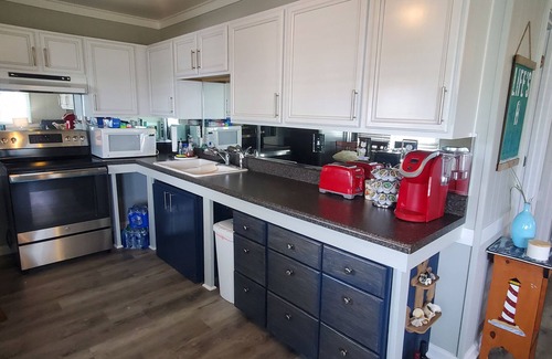 Surf City Cabaña | Deep-Water Canal Front Coastal Cottage Only Steps to the Beach & Pet Friendly!