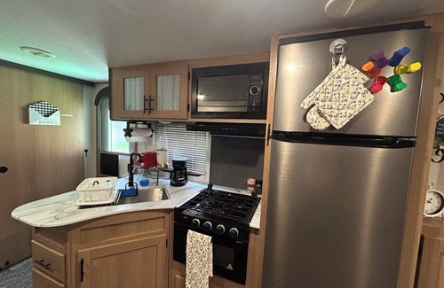 Fellowship Casa | Delightful 1-bedroom RV with parking on premises