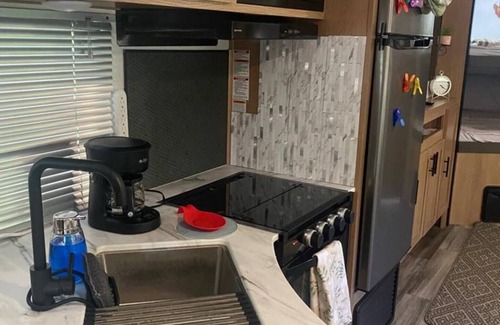 Fellowship Casa | Delightful 1-bedroom RV with parking on premises