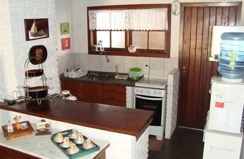 Praia Rasa Condominio | Encantadora casa de playa en cond w / piscina sauna campo de fútbol 300ms playa