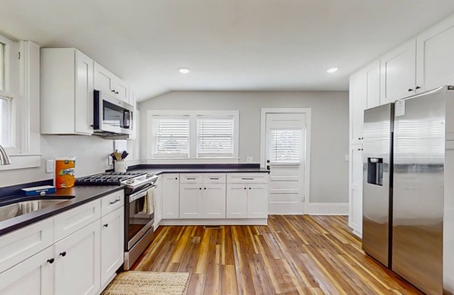 Rogers Casa | Delightful Rogers getaway w/ full kitchen, dog-friendly yard, Wifi, AC & W/D