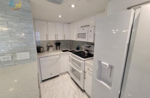 Mid Beach Apartamento | Deluxe Beach Resort - HORA RENTALS