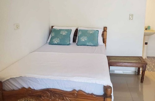 Playa San Diego Complejo | Deluxe bedroom with 4 queen beds, accommodates 8 guests, located in El Tenis.
