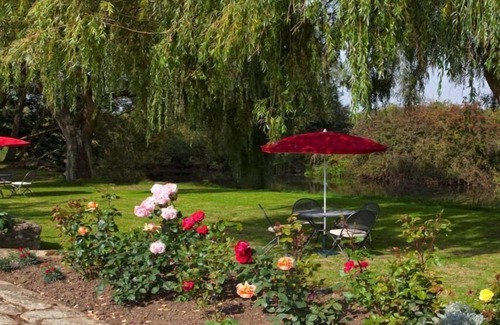 Oxford Apartamento | Lodge-De Lujo-Baño Privado-Vista al rio-Private Garden
