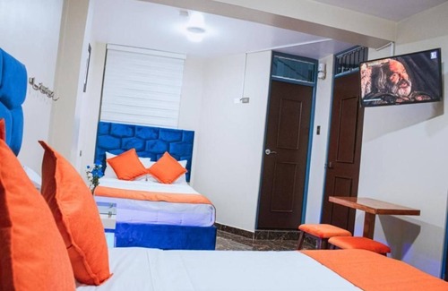 Santiago de Surco Apartamento | Deluxe Queen Room with Two Queen Beds 2