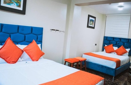 Santiago de Surco Apartamento | Deluxe Queen Room with Two Queen Beds 2