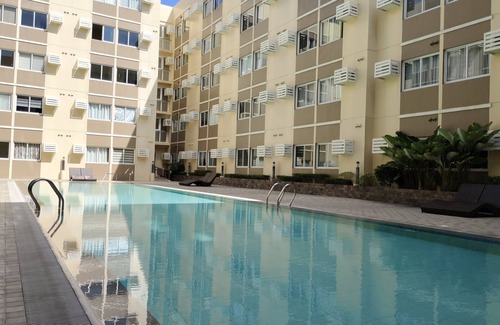 Binan City Condominio | Deluxe Studio - Fast WiFi, 55" UHD TV with Netflix & Prime Video, Free Pool