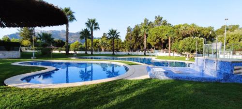 Les Deveses Apartamento | Denia Beach Apartment Jardín privado y piscina