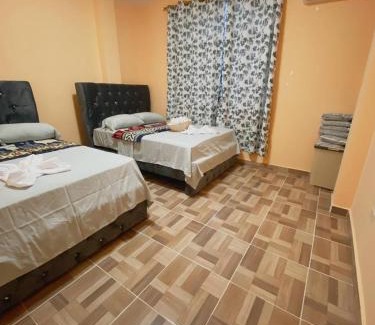 Puerto Baquerizo Moreno Apartamento | Departamento en San Cristóbal a 5 minutos del malecón, con 2 habitaciones, 4 camas, sala de estar, área de comedor, cocina equipada y excelente ubicación - Marysol - Galápagos Home