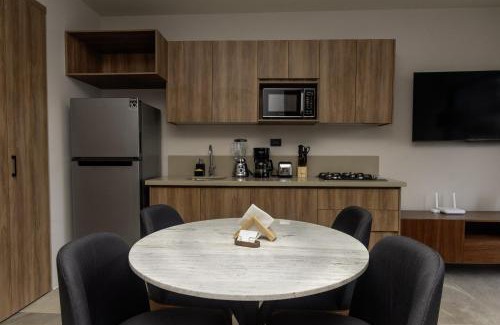 Zona Minerva Apartamento | Departamento con cama queen, alberca, gimnasio y coworking, a minutos de Expo Guadalajara