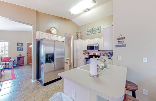 Apache Junction Casa | Desert charmer with enclosed yard, heated pool, smart TVs, W/D, & full kitchen
