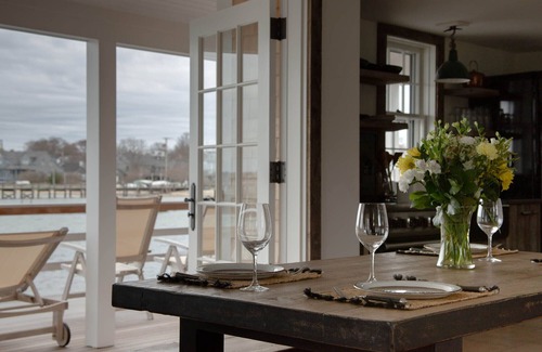 Nantucket Town Cabaña | Design cottage on wharf in town - huge private deck, private dock