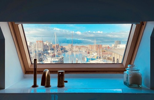 Vissershaven Casa | Design house overlooking harbor, 5-minute walk from the beach