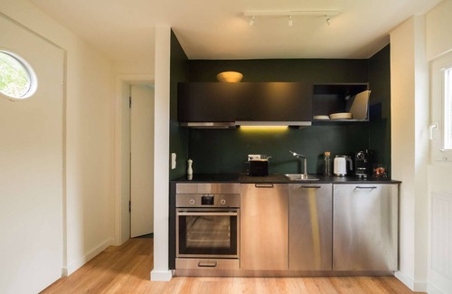 St. Peter-Ording Apartamento | Estudio de diseño en 2 niveles. Piscina, sauna, jardín, terraza.