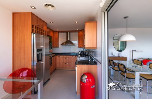 Sant Pere de Ribes Apartamento | Apartamento de diseño Casa Del Mar con aire acondicionado, piscina comunitaria y vistas al mar