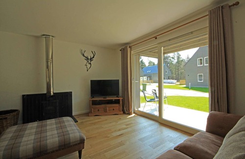 Coylumbridge Casa | Casa de vacaciones independiente con bañera de hidromasaje y sauna en la pista de esquí de Aviemore