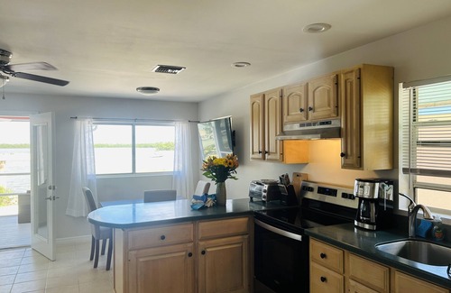 Naples Apartamento | Direct panoramic waterfront views