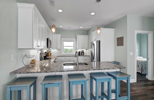 Village of Stump Sound Casa | Discounted Rates - Pool - Elevator - Pets