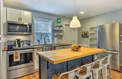 Harold Casa | Discover Milton charm, steps away from your cozy 2-bedroom retreat.