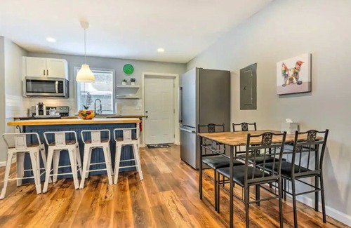 Harold Casa | Discover Milton charm, steps away from your cozy 2-bedroom retreat.