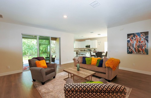 Palm Bay Casa | Discover Palm Bay by staying at this picturesque four-bed, three-bath home.