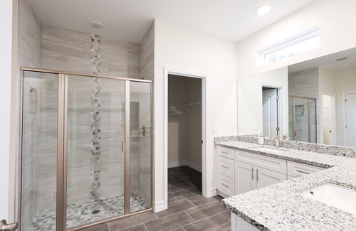 Palm Bay Casa | Discover Palm Bay by staying at this picturesque four-bed, three-bath home.