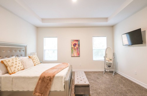 Palm Bay Casa | Discover Palm Bay by staying at this picturesque four-bed, three-bath home.