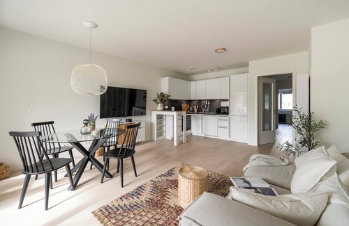Obere Au Apartamento | Discover the "Holiday" - Where City Living Meets cozy Tranquility!