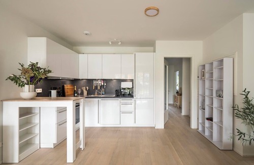 Obere Au Apartamento | Discover the "Holiday" - Where City Living Meets cozy Tranquility!