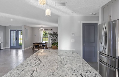 Haines City Casa | Disney Poolside Paradise for Relaxation, Celebration & Work