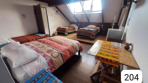 Sucre Hotel | Distrito Hostal Y Gatro bar
