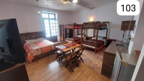 Sucre Hotel | Distrito Hostal Y Gatro bar