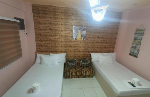 Cabanatuan Apartamento | DJCI Apartelle Walk to Robinson & NE Pacific Mall 3 Min to SM Cabanatuan