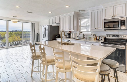 Runaway Bay Casa | Dock & Fire Pit: Riverfront Runaway Bay Retreat