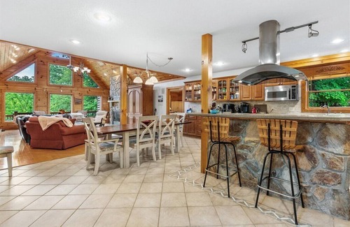 Bracey Casa | Docksology | Log Cabin Retreat | Sleeps 21