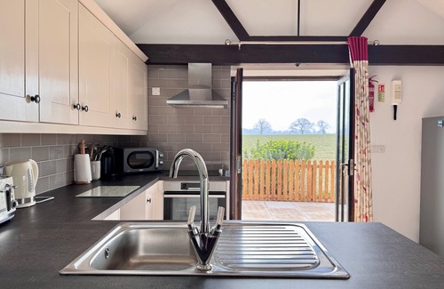Dilham Casa | Dog and family friendly barn conversion with fully enclosed garden and hot tub