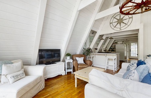 Charlevoix Casa | Dog-friendly A-frame home near beaches & downtown with firepit, deck, badminton