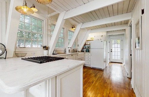 Charlevoix Casa | Dog-friendly A-frame home near beaches & downtown with firepit, deck, badminton