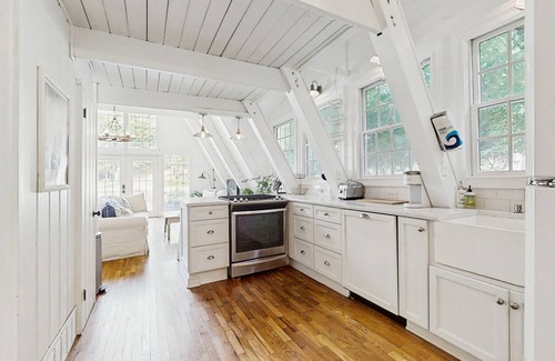 Charlevoix Casa | Dog-friendly A-frame home near beaches & downtown with firepit, deck, badminton