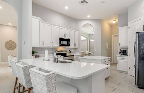 Palm River Estates Casa | Dog-friendly home close to beach with screened patio & pool, & central AC